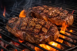 Four Pepper Steak mit BBQ Four Pepper scharf auf dem Grill angrillen